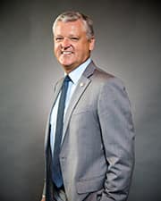 This is a head shot of Worldwide Chancellor Dr. John Watret